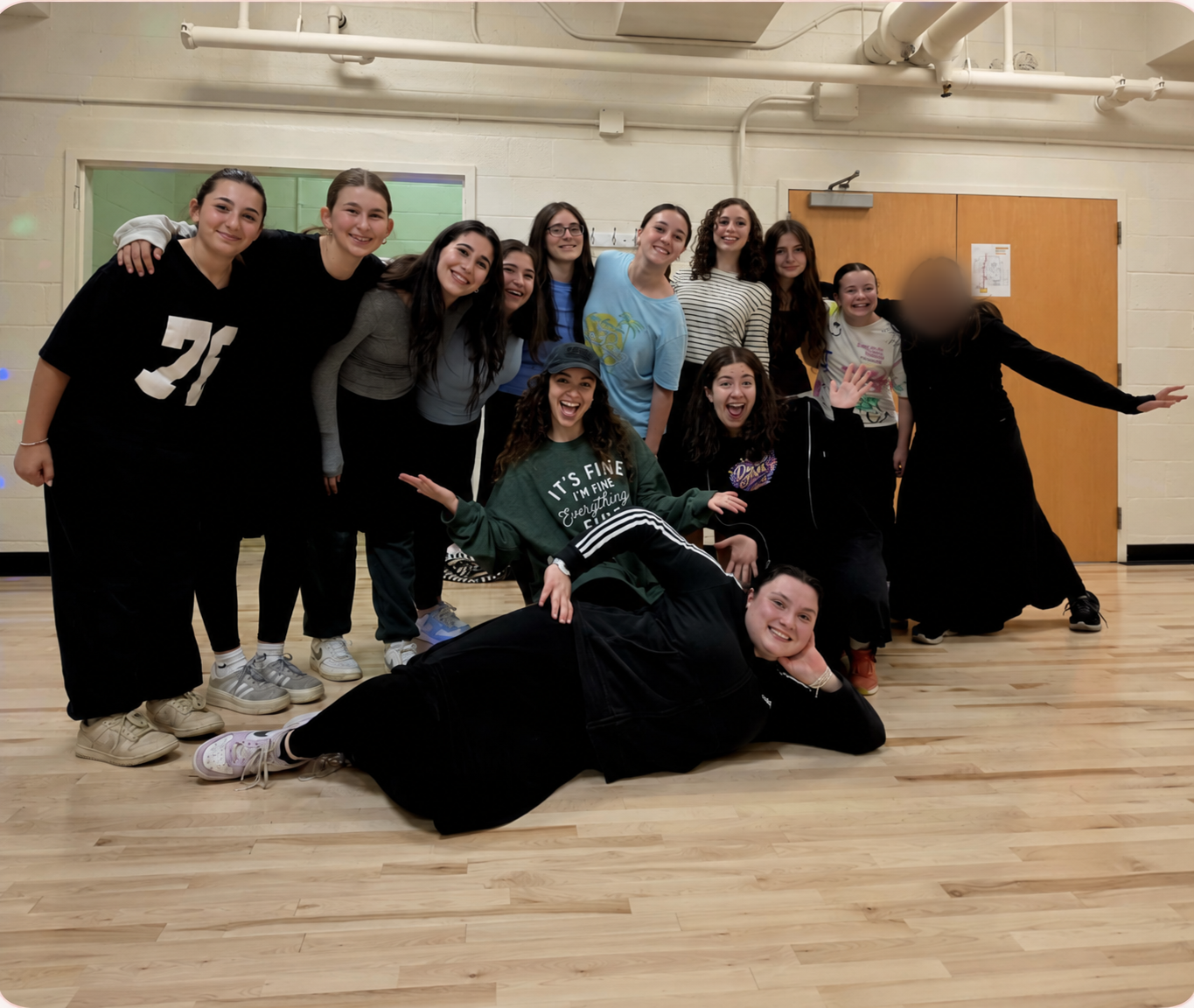 Kesher Dance Studio dancers together in the studio
